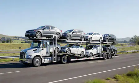 Multi-level car carrier on the highway to Forest Grove, Oregon, United States