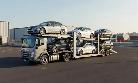 Car transporter loaded with vehicles in Forest Grove, Oregon, United States