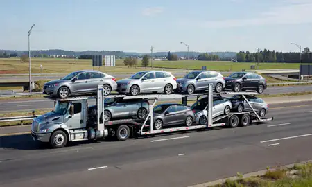 Multi-level car carrier on the highway to Gresham, Oregon, United States