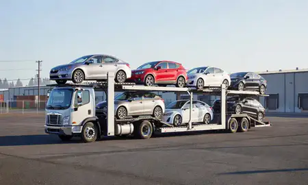 Car transporter loaded with vehicles in Gresham, Oregon, United States