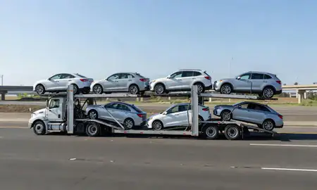 Multi-level car carrier on the highway to Hillsboro, Oregon, United States