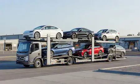 Car transporter loaded with vehicles in Lake Oswego, Oregon, United States