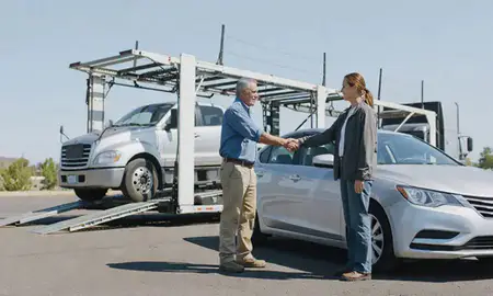 Vehicle owner beside their delivered car in Medford, Oregon, United States