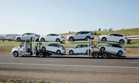 Multi-level car carrier on the highway to Oregon City, Oregon, United States