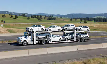 Multi-level car carrier on the highway to Roseburg, Oregon, United States