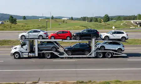 Multi-level car carrier on the highway to Baldwin, Pennsylvania, United States
