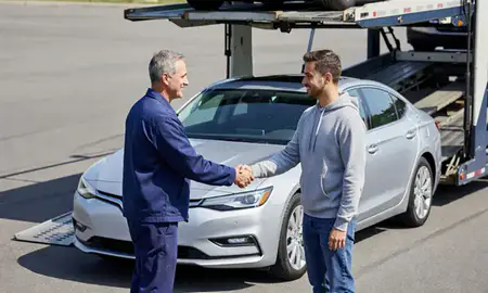 Vehicle owner beside their delivered car in Bethel Park, Pennsylvania, United States