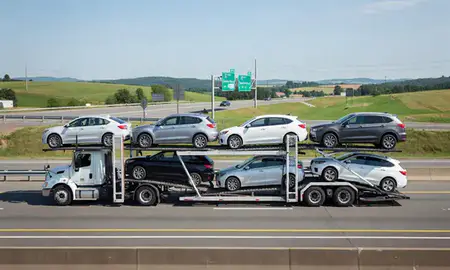 Multi-level car carrier on the highway to Chambersburg, Pennsylvania, United States