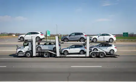 Multi-level car carrier on the highway to Lebanon, Pennsylvania, United States