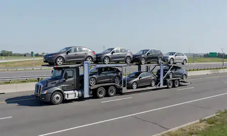 Multi-level car carrier on the highway to Norristown, Pennsylvania, United States