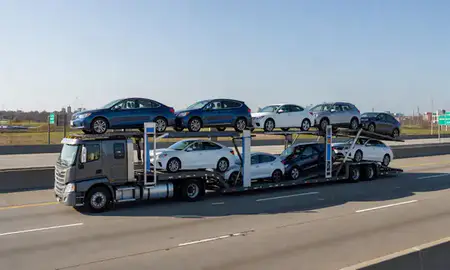 Multi-level car carrier on the highway to Philadelphia, Pennsylvania, United States