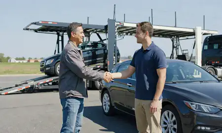 Vehicle owner beside their delivered car in Reading, Pennsylvania, United States
