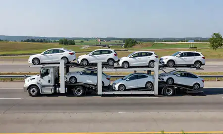 Multi-level car carrier on the highway to York, Pennsylvania, United States
