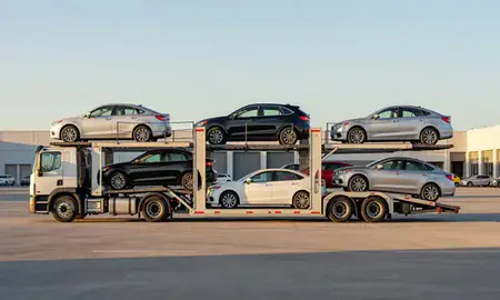 Car transporter parked in an industrial area of Candelaria, Puerto Rico, United States