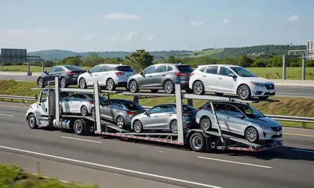 Multi-level car carrier on the highway to Canóvanas, Puerto Rico, United States