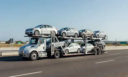Multi-level car carrier on the highway to Cataño, Puerto Rico, United States