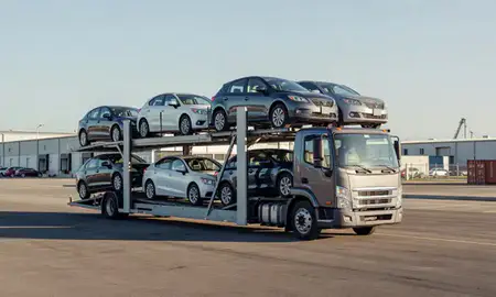 Car transporter loaded with vehicles in Guayama, Puerto Rico, United States