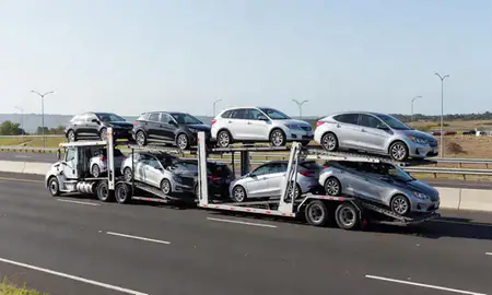 Multi-level car carrier on the highway to Sabana Grande, Puerto Rico, United States