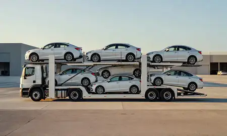 Car transporter parked in an industrial area of San Germán, Puerto Rico, United States
