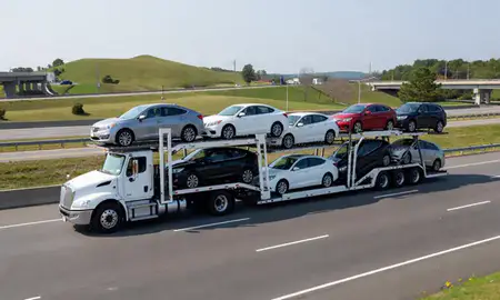 Multi-level car carrier on the highway to Cumberland Hill, Rhode Island, United States