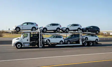 Multi-level car carrier on the highway to East Providence, Rhode Island, United States