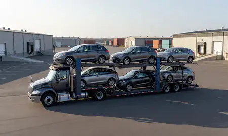 Car transporter loaded with vehicles in Harrisville, Rhode Island, United States
