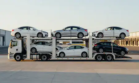 Car transporter parked in an industrial area of Kingston, Rhode Island, United States