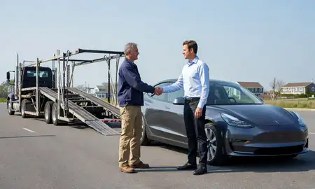 Vehicle owner beside their delivered car in Newport East, Rhode Island, United States