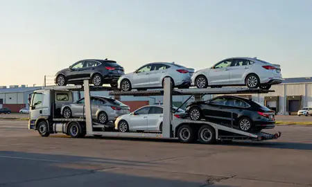 Car transporter loaded with vehicles in Newport East, Rhode Island, United States