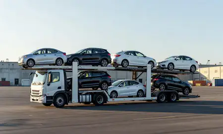 Car transporter loaded with vehicles in Newport, Rhode Island, United States