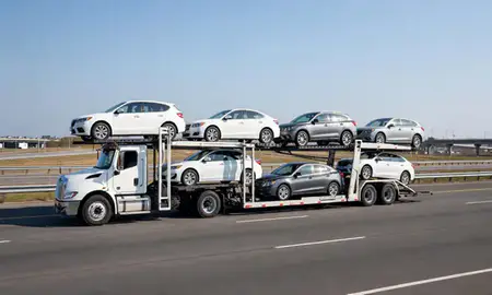 Multi-level car carrier on the highway to Pawtucket, Rhode Island, United States