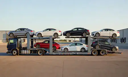 Car transporter parked in an industrial area of Providence, Rhode Island, United States