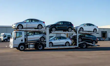 Car transporter loaded with vehicles in Quonochontaug, Rhode Island, United States