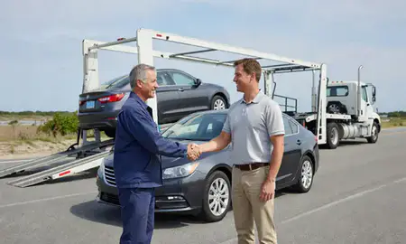 Vehicle owner beside their delivered car in Weekapaug, Rhode Island, United States