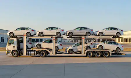 Car transporter parked in an industrial area of Wyoming, Rhode Island, United States
