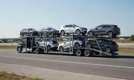 Multi-level car carrier on the highway to South Carolina, United States