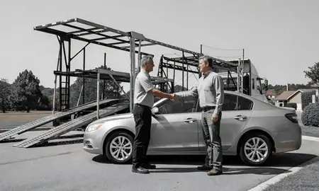Vehicle owner beside their delivered car in South Carolina, United States