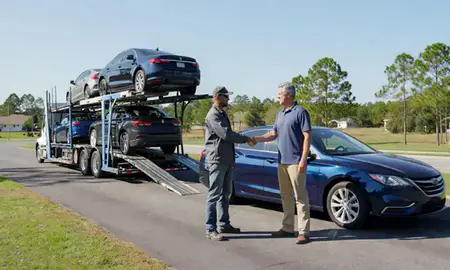 Vehicle owner beside their delivered car in Carolina Forest, South Carolina, United States