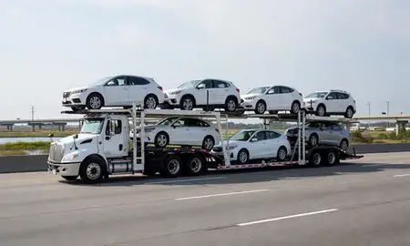 Multi-level car carrier on the highway to Charleston, South Carolina, United States