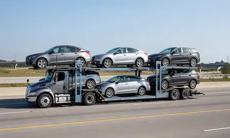 Multi-level car carrier on the highway to Columbia, South Carolina, United States