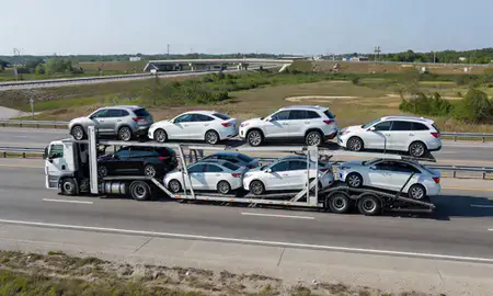 Multi-level car carrier on the highway to Goose Creek, South Carolina, United States