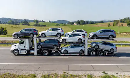 Multi-level car carrier on the highway to Greenville, South Carolina, United States