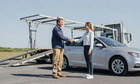 Vehicle owner beside their delivered car in Mount Pleasant, South Carolina, United States