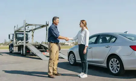 Vehicle owner beside their delivered car in North Augusta, South Carolina, United States