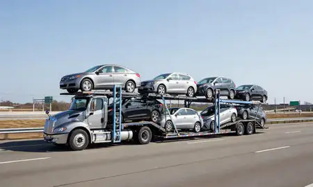 Multi-level car carrier on the highway to Socastee, South Carolina, United States