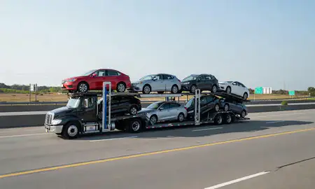 Multi-level car carrier on the highway to Spartanburg, South Carolina, United States