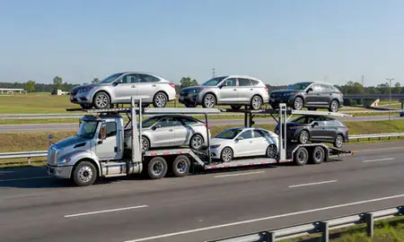 Multi-level car carrier on the highway to Summerville, South Carolina, United States