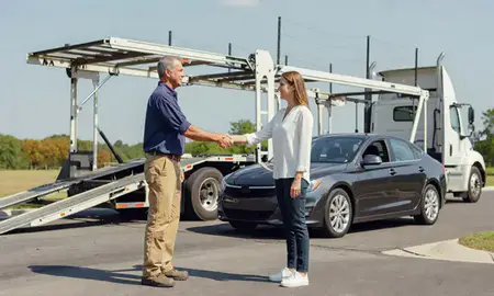 Vehicle owner beside their delivered car in Summerville, South Carolina, United States
