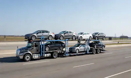 Multi-level car carrier on the highway to Sumter, South Carolina, United States