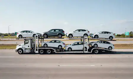Multi-level car carrier on the highway to Taylors, South Carolina, United States